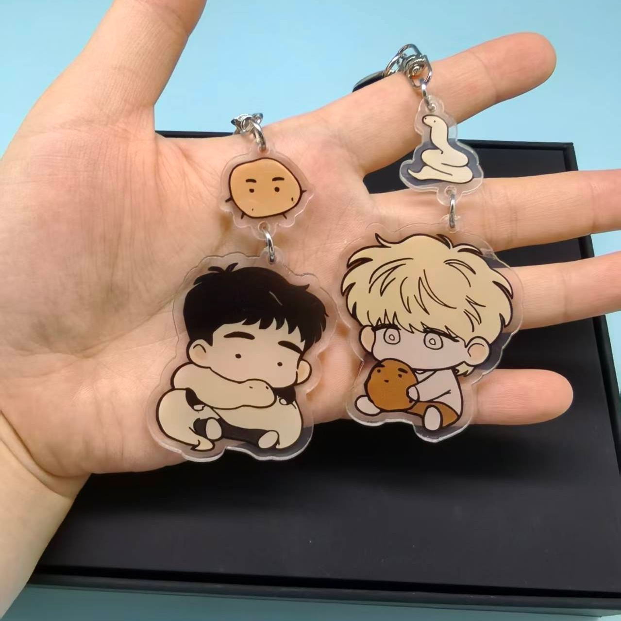 The Sacred Serpent's Seduction - Gaming Console Keychain 评论和价格