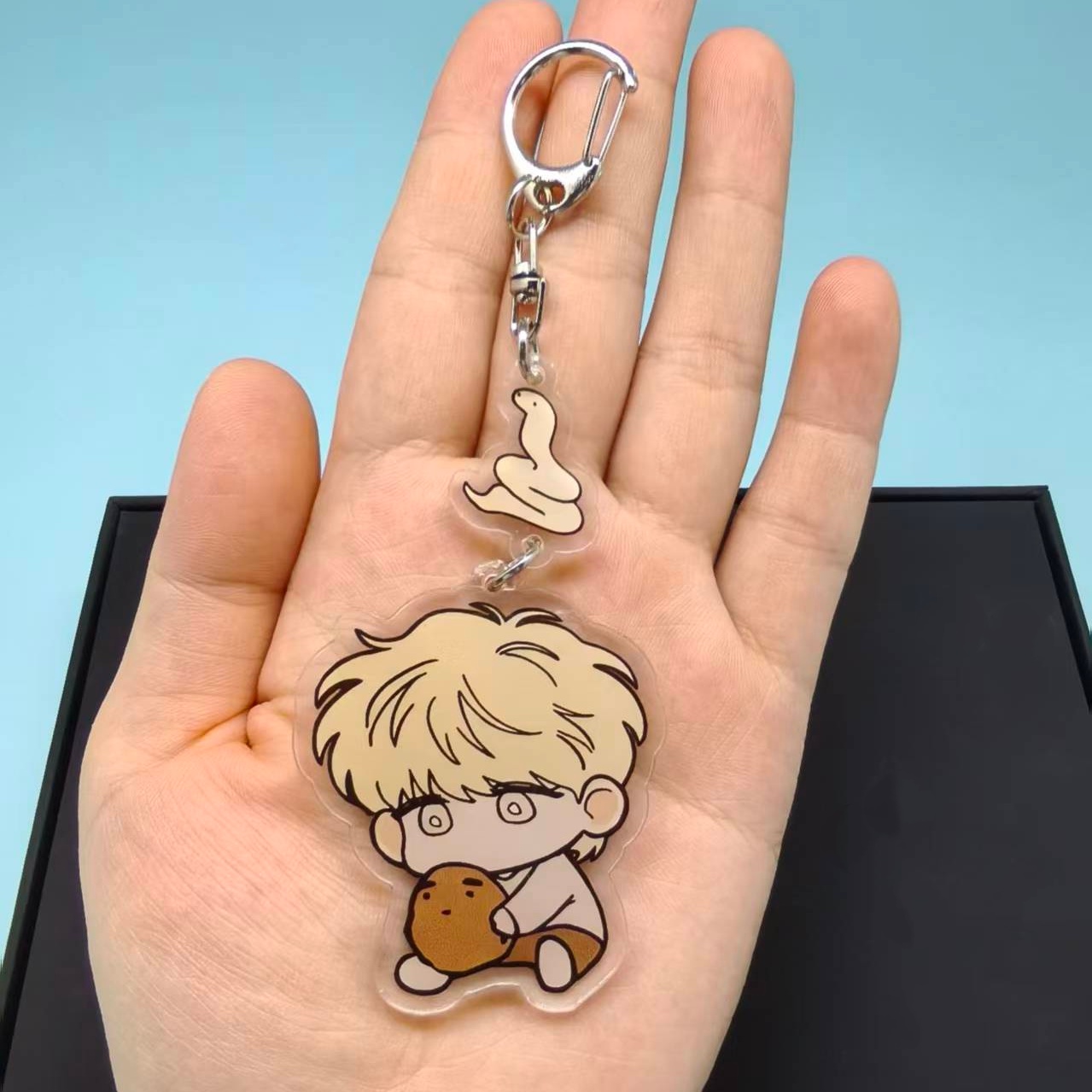 The Sacred Serpent's Seduction - Gaming Console Keychain 评论和价格