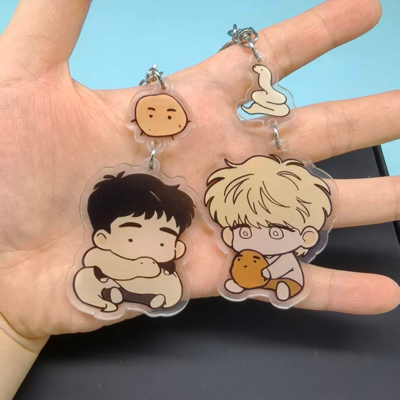 The Sacred Serpent's Seduction - Gaming Console Keychain 评论和价格
